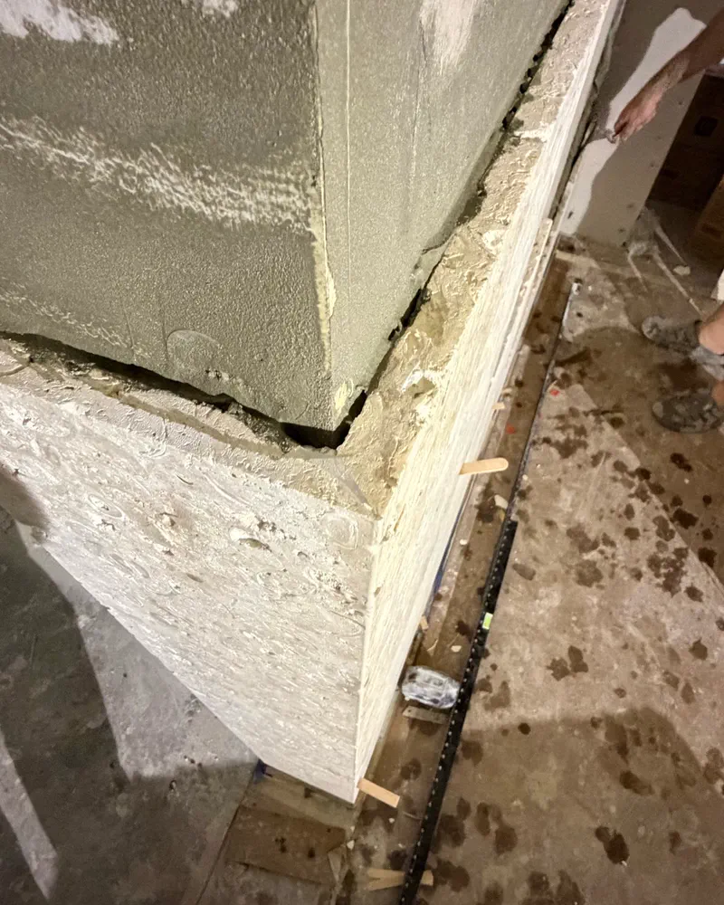 Natural stone column wrap with epoxy grout joints installed in Sarasota