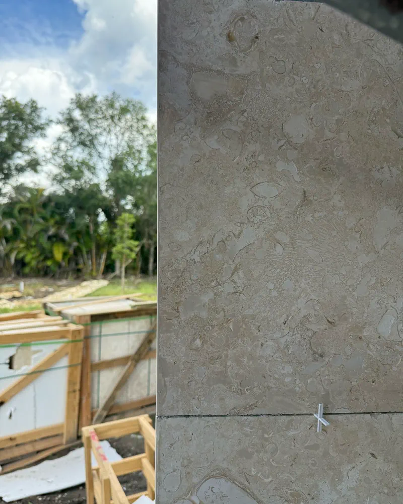 Fossil limestone exterior cladding installed by Floors of Glory in Venice FL